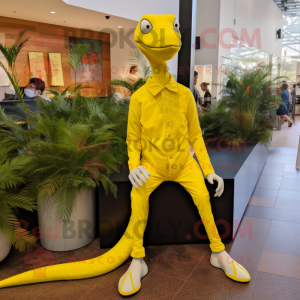 Lemon Yellow Coelophysis mascot costume character dressed with a Flare Jeans and Shoe clips