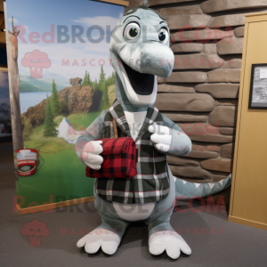 Silver Loch Ness Monster mascot costume character dressed with a Flannel Shirt and Clutch bags