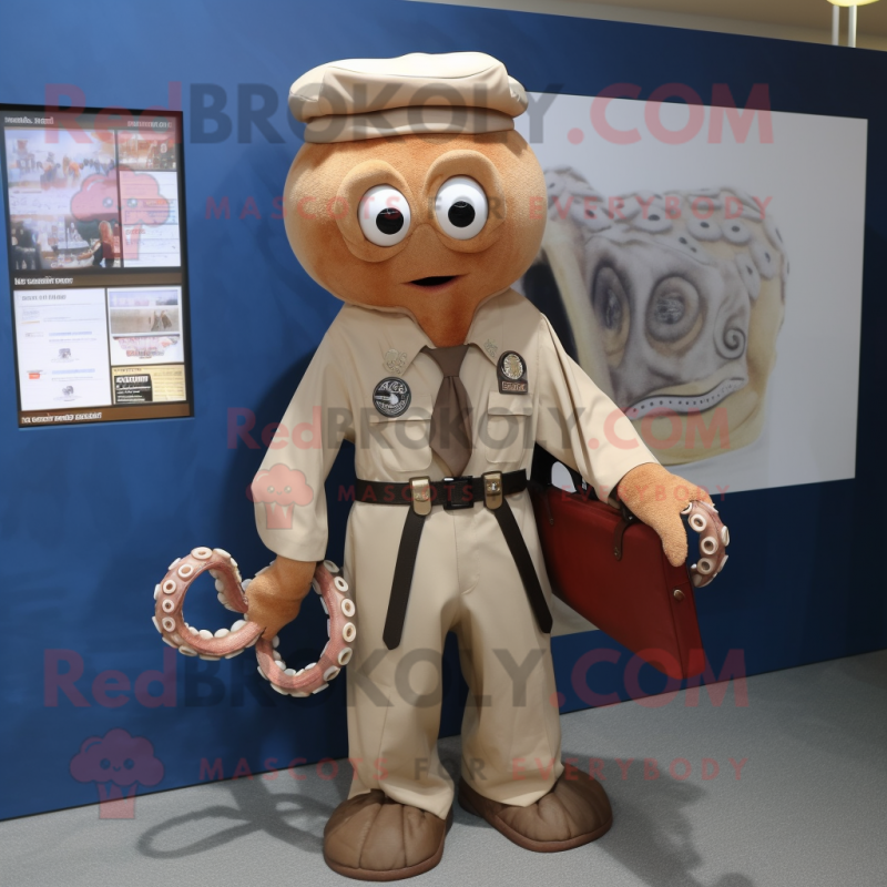 Tan Octopus mascot costume character dressed with a Oxford Shirt and Belts