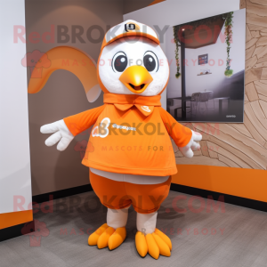 Orange Penguin mascot costume character dressed with a Blouse and Headbands