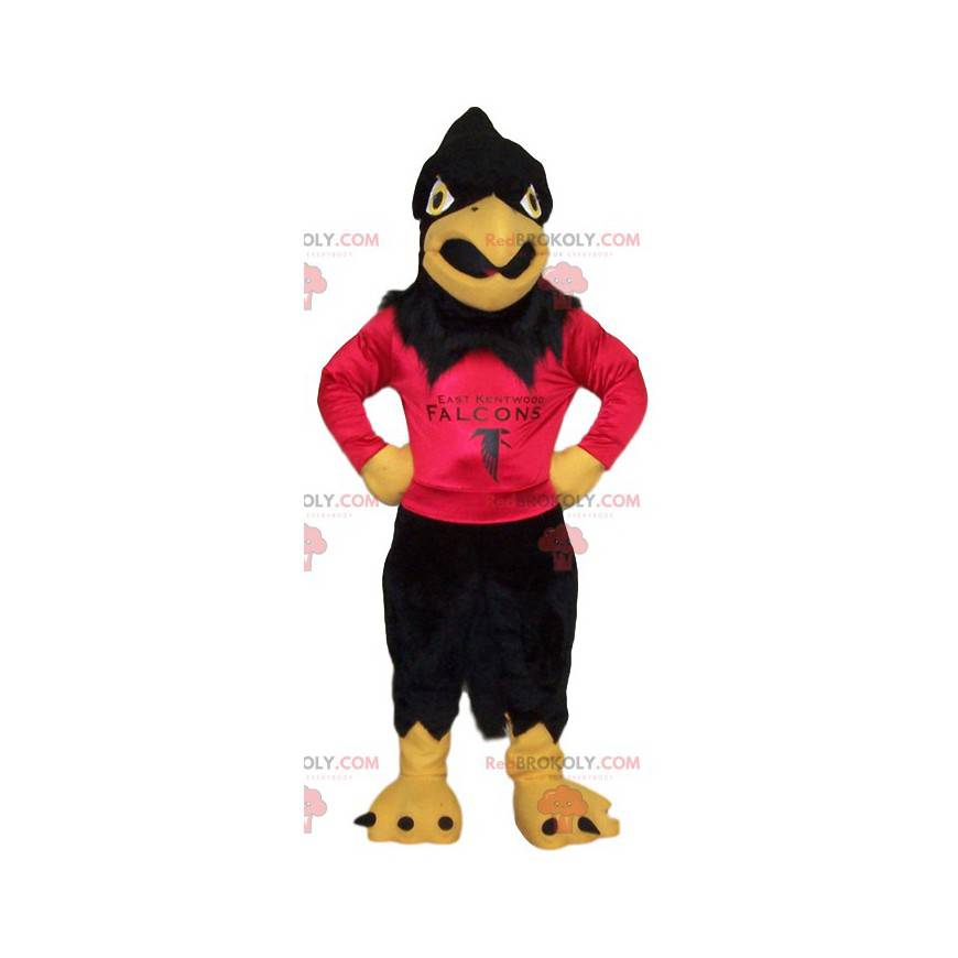 Mascote da águia dourada com sua camisa vermelha para apoiar -