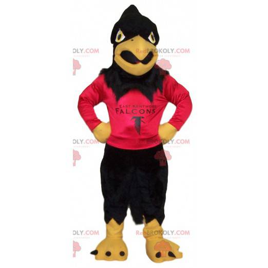 Golden eagle mascot with his red jersey to support -