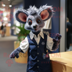 Navy Aye-Aye mascot costume character dressed with a Oxford Shirt and Earrings