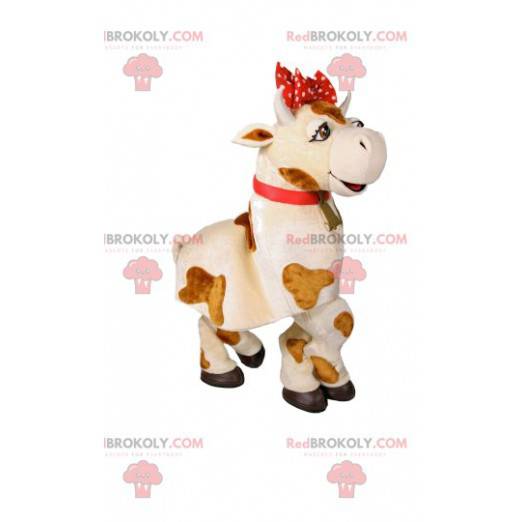 Mascotte de vache blanche et marron avec un nœud rouge -