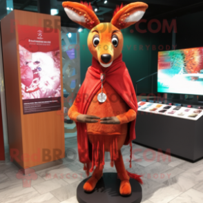 Red Roe Deer mascot costume character dressed with a Graphic Tee and Shawl pins