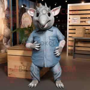 Silver Armadillo mascot costume character dressed with a Chambray Shirt and Foot pads