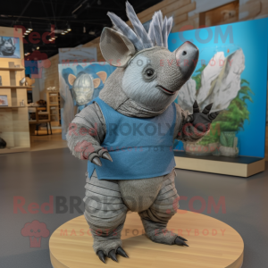 Silver Armadillo mascot costume character dressed with a Chambray Shirt and Foot pads