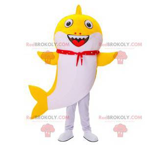 Mascotte de requin jaune et blanc avec un bandana rouge -