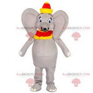 Mascotte elefante grigio con un cappello rosso e giallo -