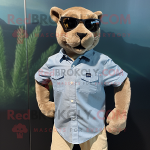 Beige Jaguarundi mascot costume character dressed with a Chambray Shirt and Cufflinks