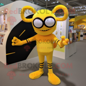 Yellow Spider mascot costume character dressed with a Jumpsuit and Reading glasses