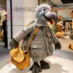 Gray Dodo Bird mascot costume character dressed with a Parka and Tote bags