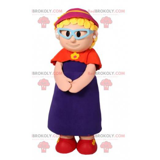 Kleine meisjesmascotte met een rood vest en een fuchsia hoed -