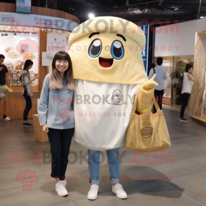 Cream Ramen mascot costume character dressed with a Boyfriend Jeans and Tote bags