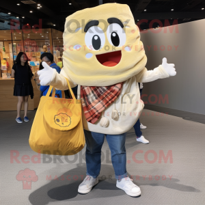 Cream Ramen mascot costume character dressed with a Boyfriend Jeans and Tote bags