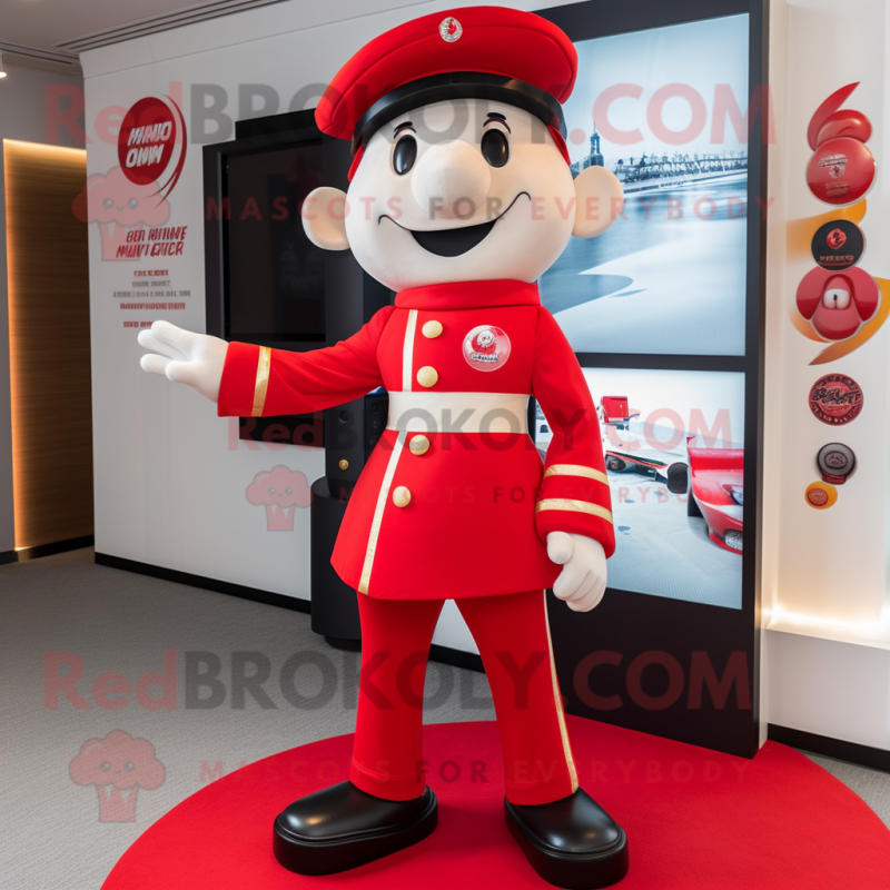Red Ring Master mascot costume character dressed with a Chinos and Berets Red Ring Master mascot costume character dressed with a Chinos and Berets