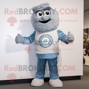 Silver Falafel mascot costume character dressed with a Denim Shorts and Digital watches
