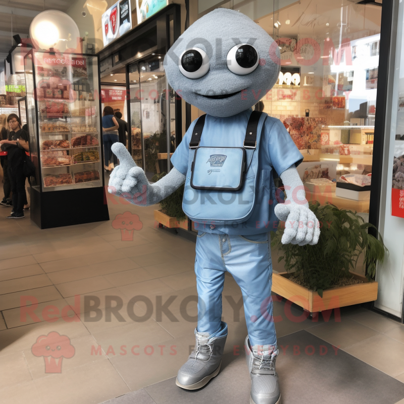 Silver Falafel mascot costume character dressed with a Denim Shorts and Digital watches