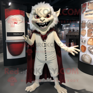 Cream Vampire mascot costume character dressed with a Henley Shirt and Foot pads