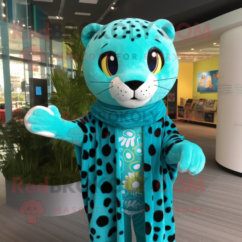 Turquoise Leopard mascot costume character dressed with a Romper and Shawls Turquoise Leopard mascot costume character dressed with a Romper and Shawls