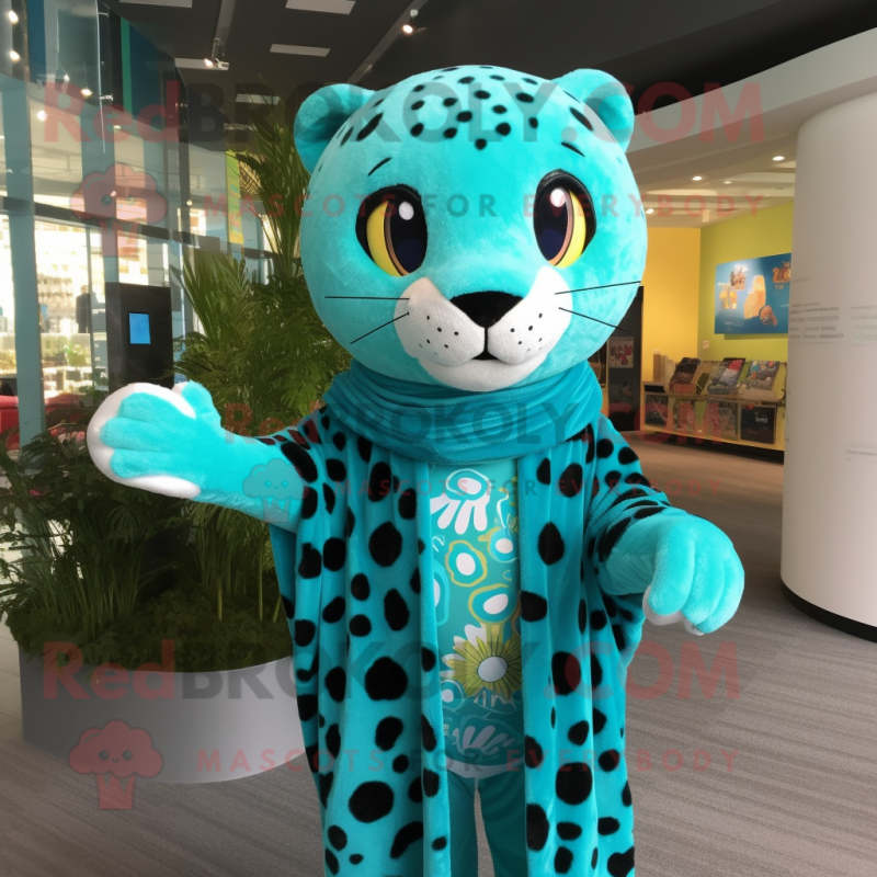 Turquoise Leopard mascot costume character dressed with a Romper and Shawls