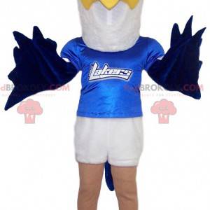 White and blue golden eagle mascot with his blue jersey -