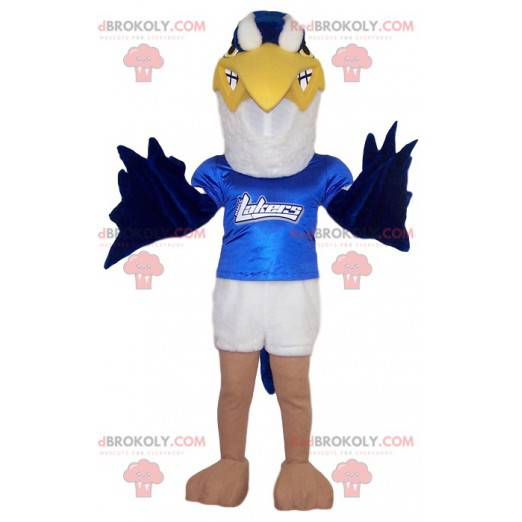 White and blue golden eagle mascot with his blue jersey -