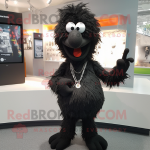 Black Aglet mascot costume character dressed with a Romper and Necklaces