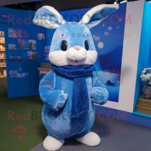 Blue Rabbit mascot costume character dressed with a Coat and Scarf clips