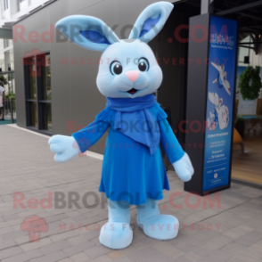 Blue Rabbit mascot costume character dressed with a Coat and Scarf clips