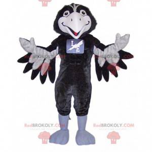 Mascotte de corbeau noir et blanc très souriant - Redbrokoly.com