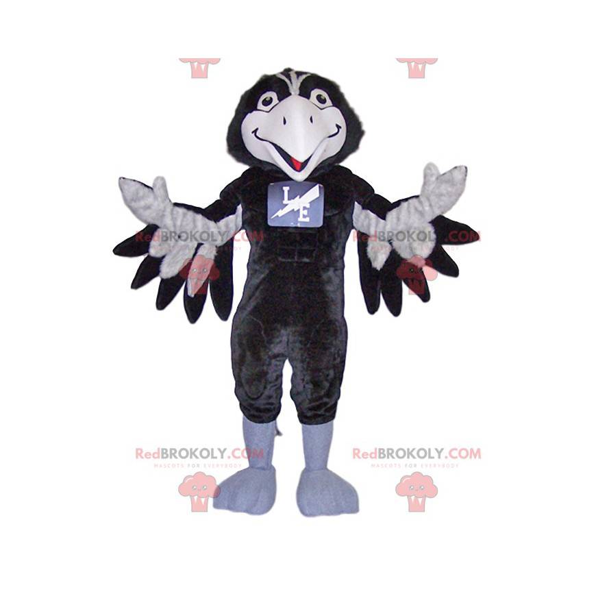 Mascotte de corbeau noir et blanc très souriant - Redbrokoly.com