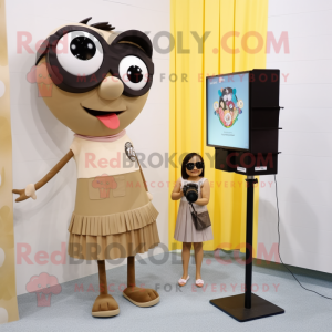Tan Camera mascot costume character dressed with a Pencil Skirt and Watches