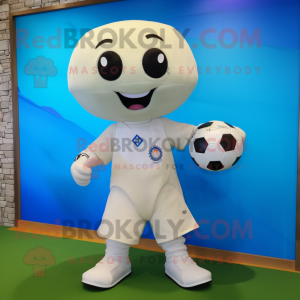 Cream Soccer Ball mascot costume character dressed with a Capri Pants and Clutch bags