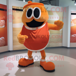 Orange Moussaka mascot costume character dressed with a Shorts and Belts