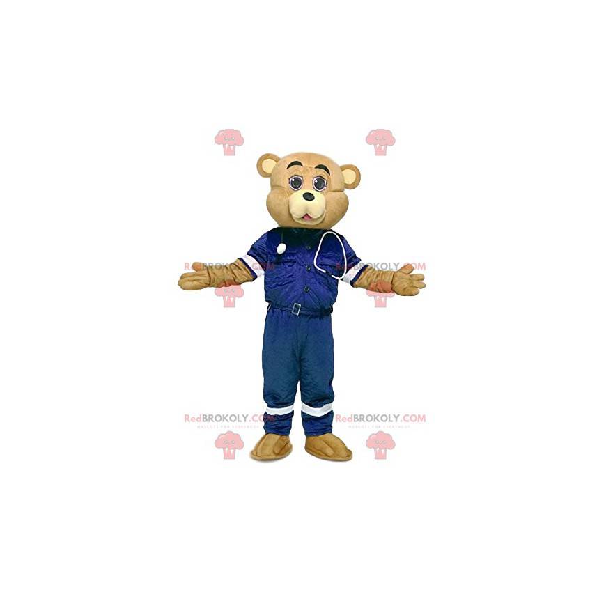 Mascota de oso de arena en traje de primeros auxilios -