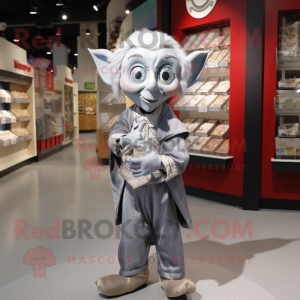 Silver Elf mascot costume character dressed with a Dress Shirt and Coin purses