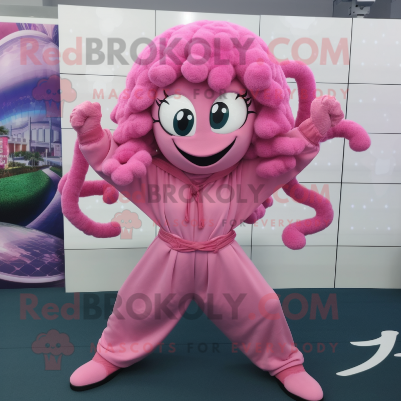 Pink Medusa mascot costume character dressed with a Hoodie and Belts Pink Medusa mascot costume character dressed with a Hoodie and Belts