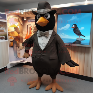 Tan Blackbird mascot costume character dressed with a Playsuit and Bow ties