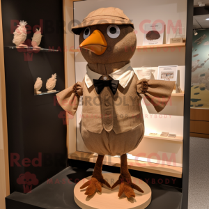 Tan Blackbird mascot costume character dressed with a Playsuit and Bow ties