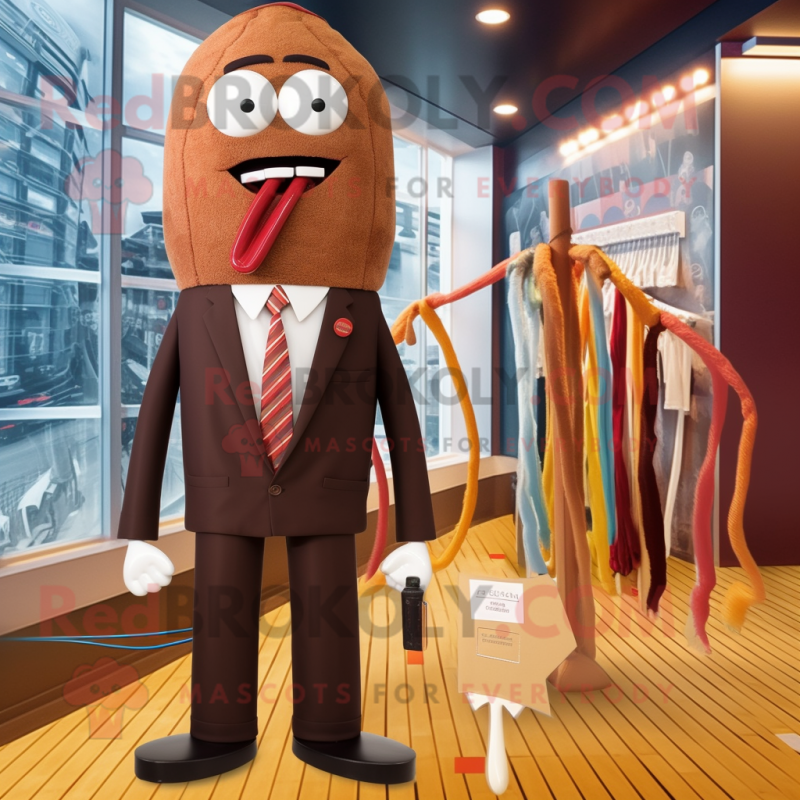 Brown Aglet mascot costume character dressed with a Swimwear and Tie pins