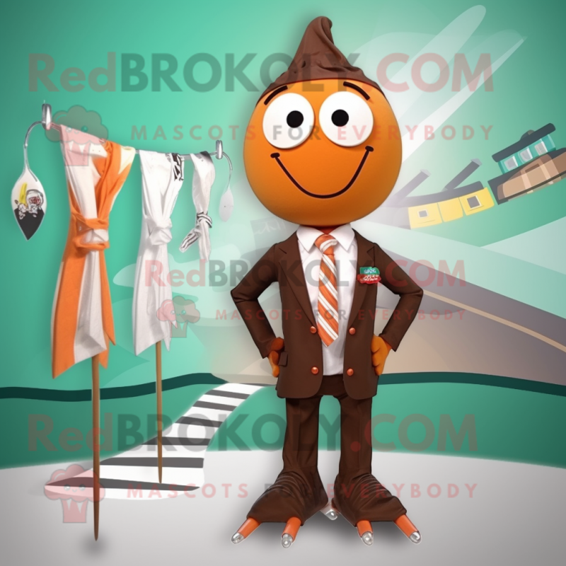 Brown Aglet mascot costume character dressed with a Swimwear and Tie pins