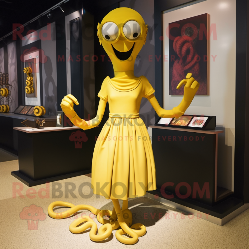 Yellow Medusa mascot costume character dressed with a Sheath Dress and Cufflinks