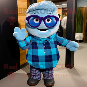 Blue Raspberry mascot costume character dressed with a Flannel Shirt and Eyeglasses