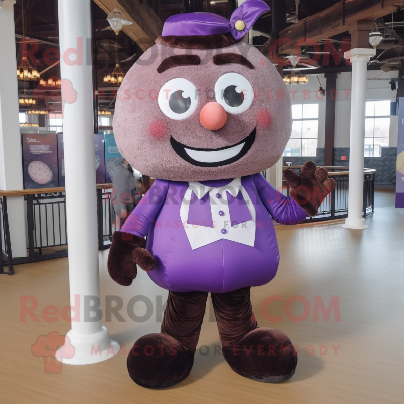 Purple Chocolates mascot costume character dressed with a Jeggings and Suspenders Purple Chocolates mascot costume character dressed with a Jeggings and Suspenders