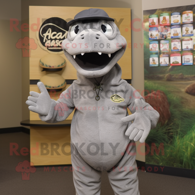 Gray Anaconda mascot costume character dressed with a Sweatshirt and Hat pins