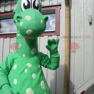 Mascota dragón dinosaurio verde con puntos blancos -