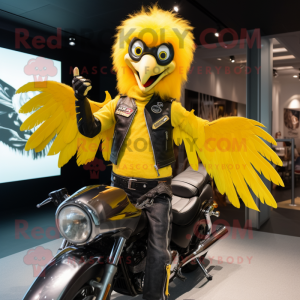 Yellow Harpy mascot costume character dressed with a Biker Jacket and Keychains