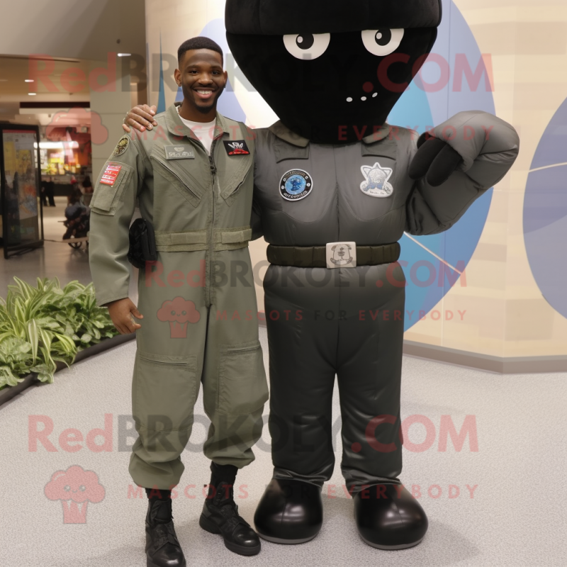 Black Air Force Soldier mascot costume character dressed with a Mom Jeans and Digital watches