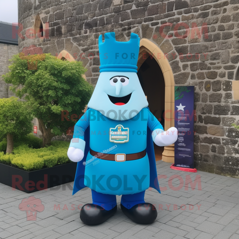 Blue Irish Castle mascot costume character dressed with a T-Shirt and Shoe clips Blue Irish Castle mascot costume character dressed with a T-Shirt and Shoe clips